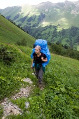 Fototapeta na wymiar Backpacker tourist in the mountains.