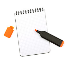 Orange marker on notepad