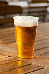 beer standing on a wooden table
