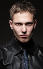 serious man over dark background