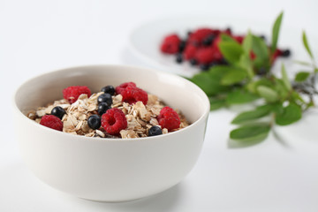 Granola with raspberries and blueberries