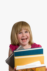 child laughing with books
