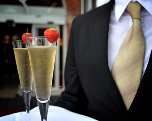 Champagne in flutes with strawberries