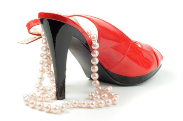 Red shoe with jewelry