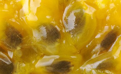 Closeup of seeds and pulp of passionfruit (Selective Focus)
