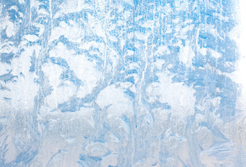 Frosty natural pattern on winter glass