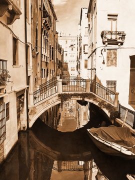 Retro style photo of canal in Venice,Italy.