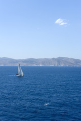 Sailing yatch in the wind