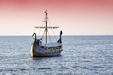 Sunset with retro ship.