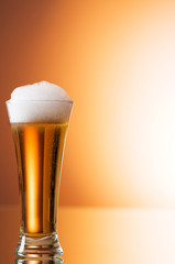 Beer glasses against the colorful gradient background