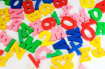 Children letters and digits on the table