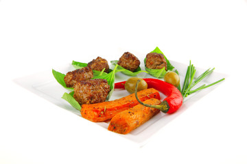 grilled cutlets on basil leafs