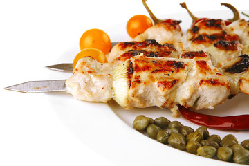 roasted pork kebab on white