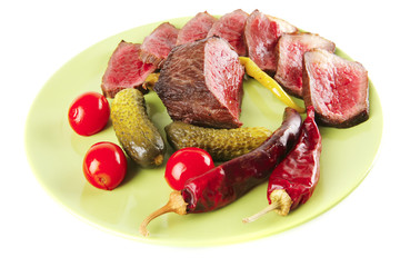 meat and vegetables with peppers