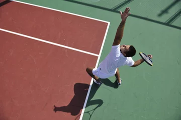 Zelfklevend Fotobehang young man play tennis outdoor © .shock