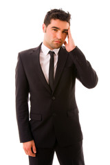 Young Businessman with a headache, isolated on white