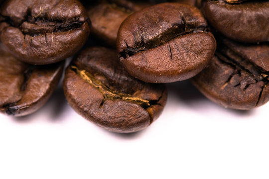 macro shot of coffe bens, isolated on white