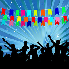 Silhouettes of dancing people on a celebratory background