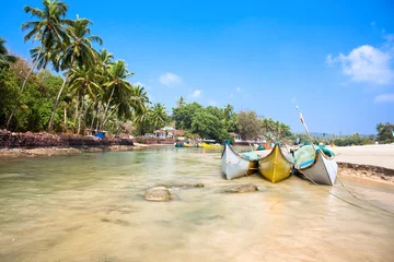 Papier Peint photo autocollant Inde Beautiful view on small indian river with  fishing boats