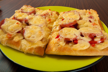 Pizza on green plate