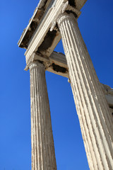 Ancient columns with blue sky in Greece