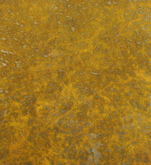 very rusty yellow orange metal steel plate with lots of scratche