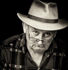 senior male with sad or grumpy face portrait - 25084912