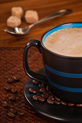Frothy cup of morning coffee