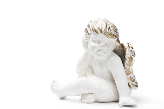 weisse denkende weihnachtsengelfigur mit goldenen haaren