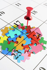 Thumb Tack on Calendar with Puzzles