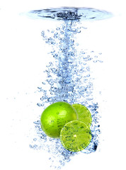Fresh lime dropped into the water