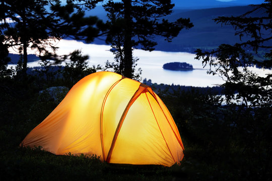 Tent lit up at dusk