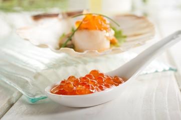 salmon eggs over spoon - uova di salmone
