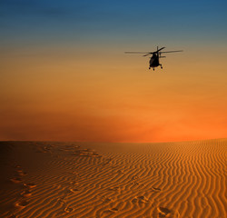 helicopter over dersert