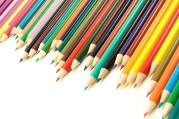 set of multicolored pencils on white background