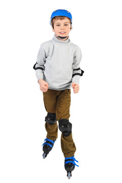 little boy in blue helmet smiling and rollerblading isolated