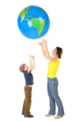 mother and son throw up inflatable globe, side view, isolated