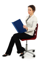 young attractive woman in business dress sitting on chair