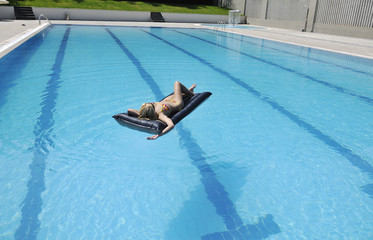 woman relax on swimming pool