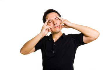 young casual man with a headache, isolated on white