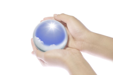 Children's hands on the world.