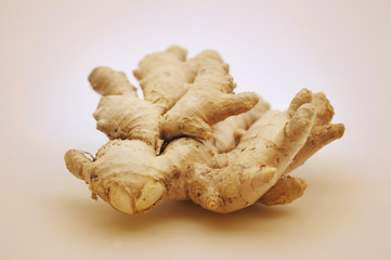 Ginger root on brown background