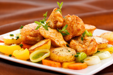 Roasted chicken meat with vegetable salad