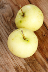 organic apples on the wood board