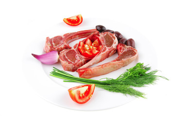 fresh raw ribs on plate