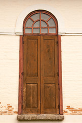 Wood door of old church in north of Thailand