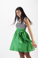 Attractive Young Woman in a Green Skirt