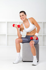 pretty young fit woman working out