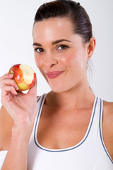 healthy fitness woman eating apple