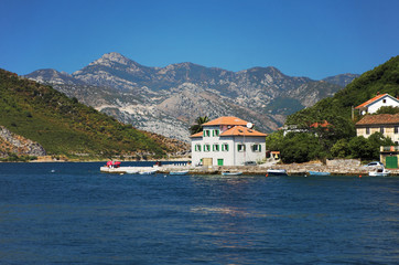 Fototapeta na wymiar House on the shore of Kotor Bay, Montenegro